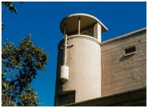 Before: view of siren tower prior to rehabilitation